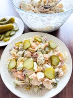 This Dill Pickle Pasta Salad is creamy, tangy, and packed with crunchy pickle goodness in every bite! Tossed with tender pasta and a flavorful, zesty dressing, it’s the perfect side dish for barbecues, potlucks, picnics, or easy weekday lunches. 🥗🥒

INGREDIENTS
3 Cups Cooked Pasta
1 Cup Dill Pickles diced
1 Cup Cheddar Cheese diced
1 Cup Crispy Bacon crumbled
1 Tbsp Fresh Dill
1/2 Cup Sour Cream
1/4 Cup Pickle Juice
1 Packet Ranch Dressing Seasoning Packet
2 Tbsp Mayo

INSTRUCTIONS
1. In a large bowl, whisk together the sour cream, pickle juice, ranch seasoning packet, and mayonnaise until smooth.
2. Next, combine the cooked pasta, chopped pickles, cheddar cheese, crispy bacon, and fresh dill.
3. Toss the pasta mixture with sauce and toss until everything is evenly coated.
4. Cover and refrigerate for at least 4 hours to allow the flavors to come together. \(Though, you can eat it immediately if you’d like!\)
5. Give the salad a final stir before serving and garnish with extra dill or chopped pickles if desired.
6. Serve and enjoy!

dill pickle pasta salad, dill pickle pasta salad recipe, dill pickle ranch pasta salad, dill pickle pasta salad spaceships, dill pickle pasta salad with cheese, pickle pasta salad, dill pickle pasta, pasta salad with pickles, dillpicklepastasalad, quick pasta salad, pasta salad, dill pickle, pickle salad, pasta salad meal prep, pasta salad ideas, dill pickles, pasta salad recipes tasty, pickle pasta recipe, easy pasta salad, cold pasta salad, best pasta salad, dill pickle food, homemade pasta salad, ranch pasta salad
