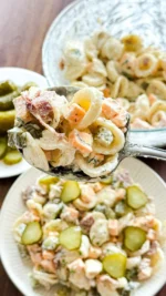 This Dill Pickle Pasta Salad is creamy, tangy, and packed with crunchy pickle goodness in every bite! Tossed with tender pasta and a flavorful, zesty dressing, it’s the perfect side dish for barbecues, potlucks, picnics, or easy weekday lunches. 🥗🥒

INGREDIENTS
3 Cups Cooked Pasta
1 Cup Dill Pickles diced
1 Cup Cheddar Cheese diced
1 Cup Crispy Bacon crumbled
1 Tbsp Fresh Dill
1/2 Cup Sour Cream
1/4 Cup Pickle Juice
1 Packet Ranch Dressing Seasoning Packet
2 Tbsp Mayo

INSTRUCTIONS
1. In a large bowl, whisk together the sour cream, pickle juice, ranch seasoning packet, and mayonnaise until smooth.
2. Next, combine the cooked pasta, chopped pickles, cheddar cheese, crispy bacon, and fresh dill.
3. Toss the pasta mixture with sauce and toss until everything is evenly coated.
4. Cover and refrigerate for at least 4 hours to allow the flavors to come together. \(Though, you can eat it immediately if you’d like!\)
5. Give the salad a final stir before serving and garnish with extra dill or chopped pickles if desired.
6. Serve and enjoy!

dill pickle pasta salad, dill pickle pasta salad recipe, dill pickle ranch pasta salad, dill pickle pasta salad spaceships, dill pickle pasta salad with cheese, pickle pasta salad, dill pickle pasta, pasta salad with pickles, dillpicklepastasalad, quick pasta salad, pasta salad, dill pickle, pickle salad, pasta salad meal prep, pasta salad ideas, dill pickles, pasta salad recipes tasty, pickle pasta recipe, easy pasta salad, cold pasta salad, best pasta salad, dill pickle food, homemade pasta salad, ranch pasta salad